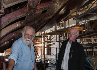 Mystic Seaport Shipyard Director Quentin Snediker (left) gives a tour of the restoration of the steamboat SABINO to Congressman Joe Courtney in September 2015.