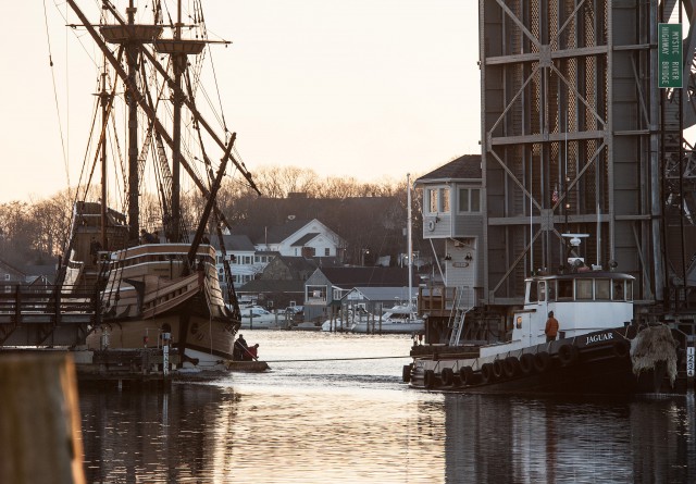 MAYFLOWER II passes through the highway bridge in downtown Mystic shortly before tying up at Mystic Seaport.