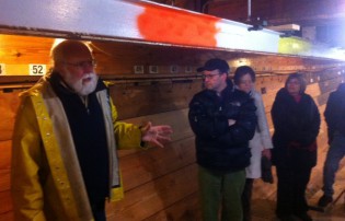 Snediker and scholars visit the Morgan's hold.