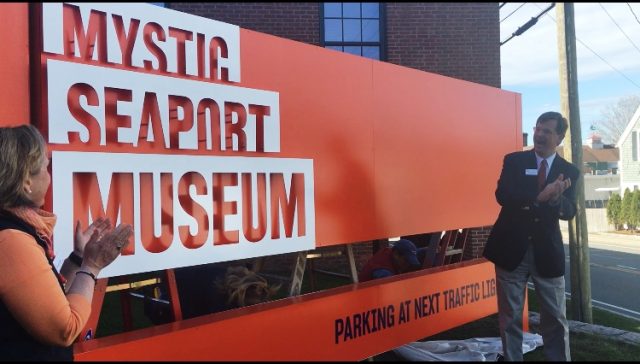 Mystic Seaport Museum President Steve White and Susan Funk, executive vice president and COO, celebrate the unveiling of the Museum's new name , logo and branding on Tuesday, May 1, 2018. Photo: Elissa Bass/Mystic Seaport Museum.