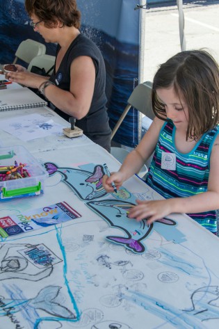 Kids can even make their own whale hat at NOAA's exhibit booth.